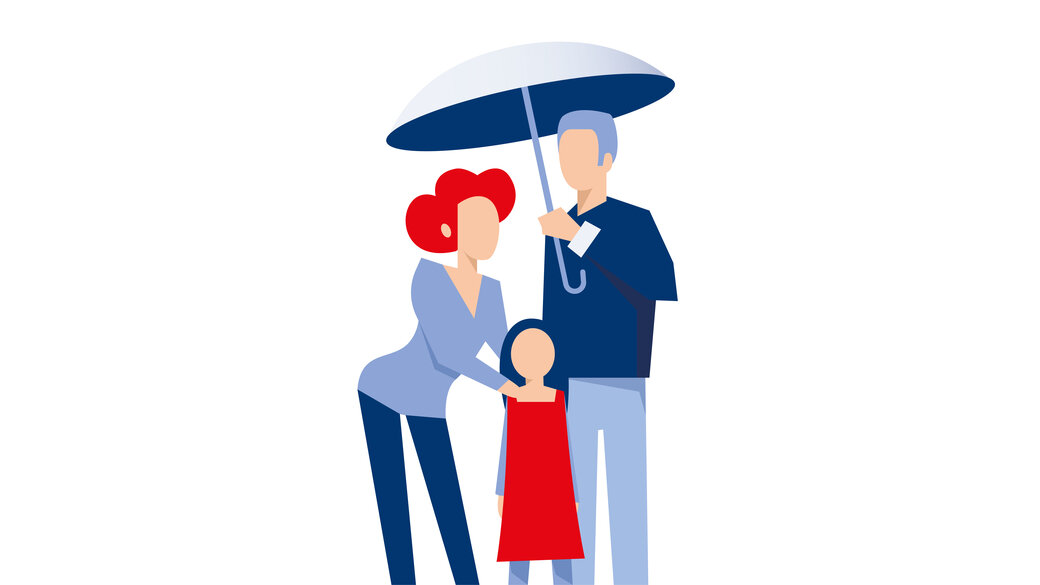Paar mit Kind unter einem Regenschirm